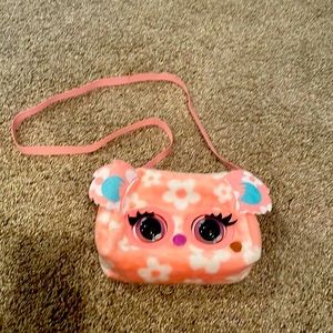 Automated animal purse